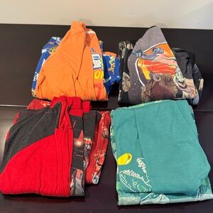 Four pairs of 6/7 boys pajamas sets with long sleeves. Cat & Jack